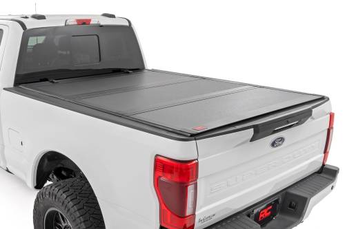 Rough Country - Rough Country Hard Tri-Fold Flip Up Bed Cover - 6'10" Bed - Ford Super Duty (17-23) - 49220651