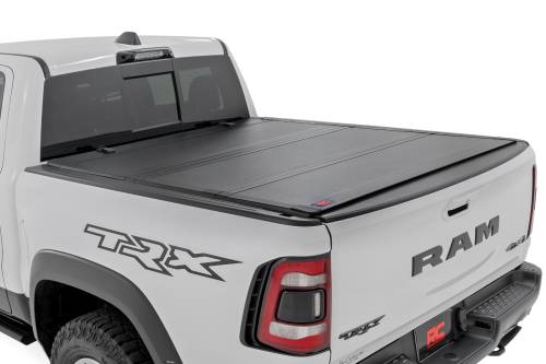 Rough Country - Rough Country Hard Tri-Fold Flip Up Bed Cover - 5'7" Bed - Ram 1500 (19-23)/1500 TRX (21-23) - 49320550