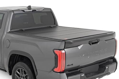 Rough Country - Rough Country Hard Tri-Fold Flip Up Bed Cover - 5'7" - Toyota Tundra (22-23) - 49514551