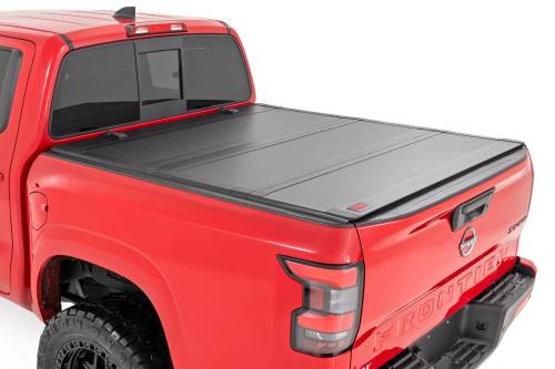 Rough Country - Rough Country Hard Tri-Fold Flip Up Bed Cover 5' Bed Nissan Frontier 2WD/4WD (22-24) - 49520551A