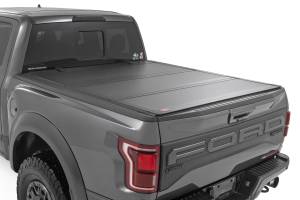 Rough Country Hard Tri-Fold Flip Up Bed Cover - 5'7" Bed - Ford F-150 (21-23)/F-150 Lightning (2022) - 49221550