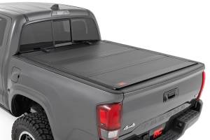 Rough Country - Rough Country Hard Tri-Fold Flip Up Bed Cover - 5&#039 Bed - Toyota Tacoma 2WD/4WD (16-23) - 49420500 - Image 1