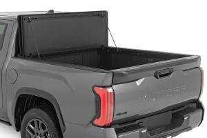 Rough Country - Rough Country Hard Tri-Fold Flip Up Bed Cover - 5'7" - Toyota Tundra (22-23) - 49514551 - Image 6